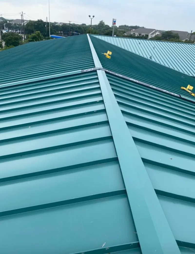 Green commercial metal roof ridge and valley for Metal Roof Repair in Georgetown
