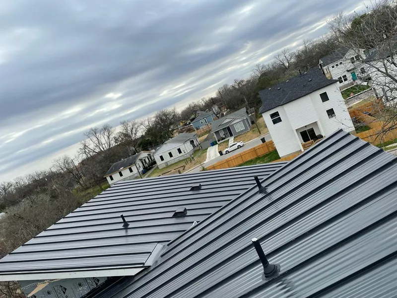 Standing seam metal roof panels with vents for Skylight Repair in Georgetown